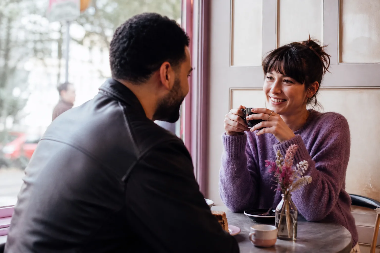 A couple walking through Wolverhampton city centre on a relaxed first date